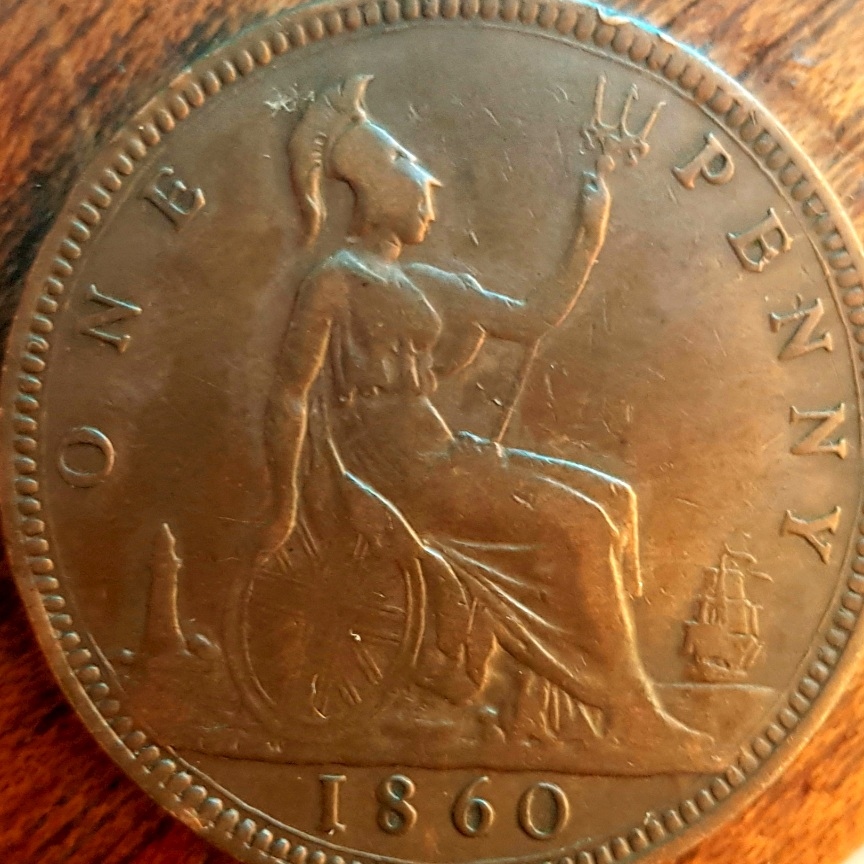 Half-Penny-Strike-Error-Or-Just-A-Old-Damaged-Coin
